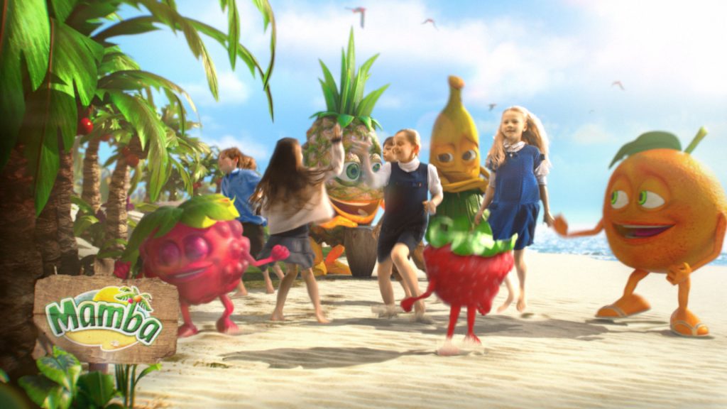 Kids and Mamba fruit chews cartoon characters dancing on a tropical beach.