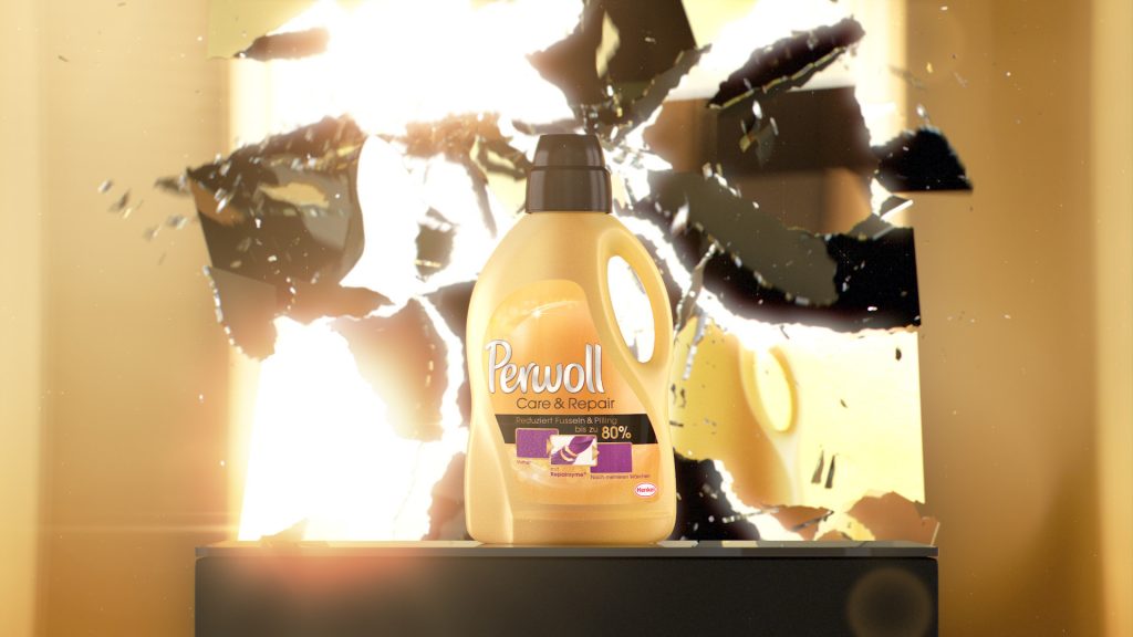VFX rendering of a yellow Perwoll Care & Repair bottle infront of a currently shattering mirror.
